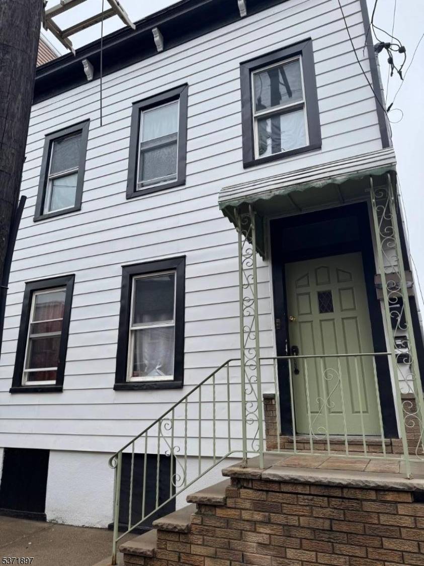 Don't miss this fantastic opportunity to own a 2 family residence in the heart of the Ironbound !