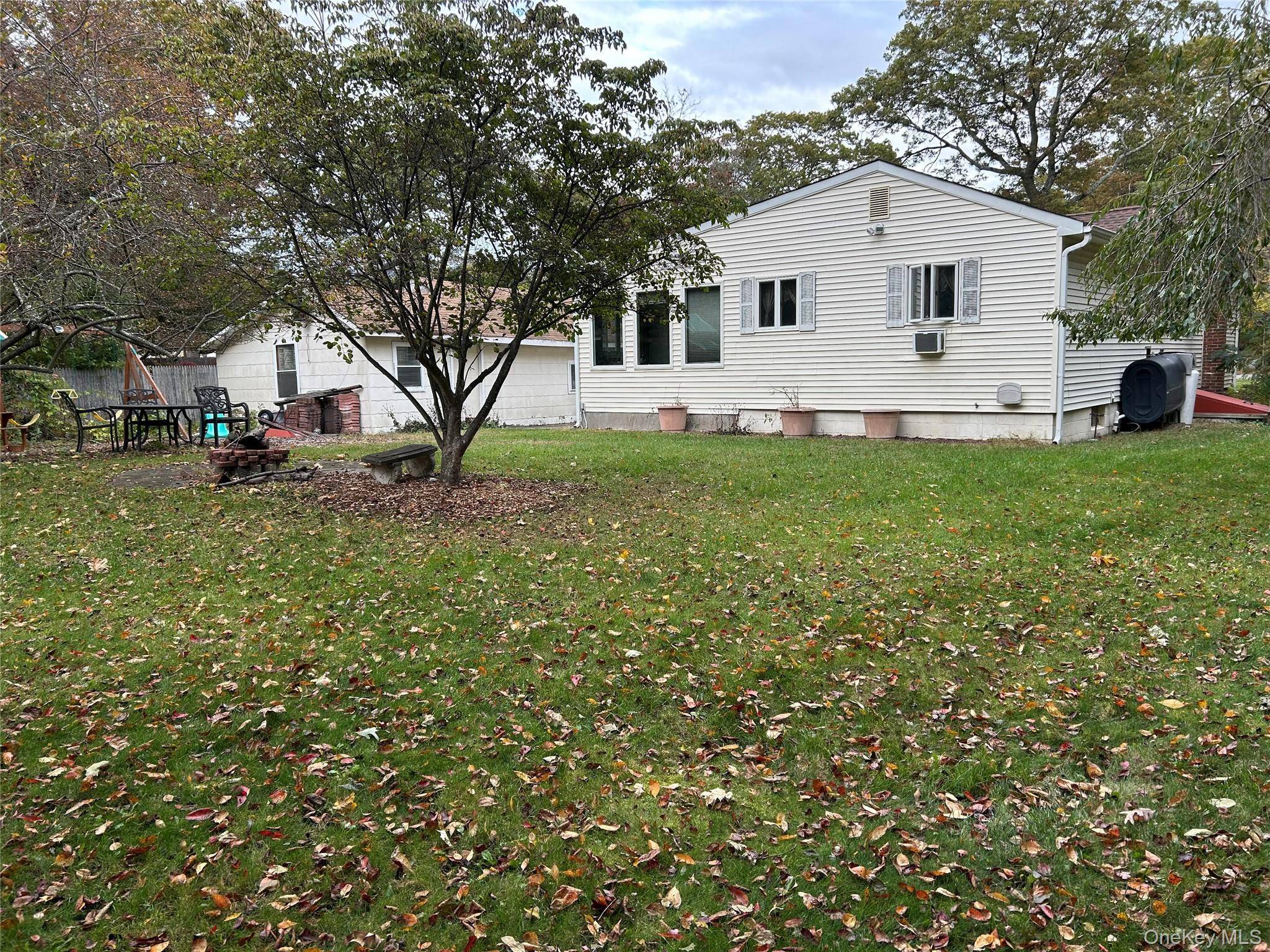 Charming Ranch located in Canaan Lake area on flat 1 2 acre plus with beautiful backyard and pond !