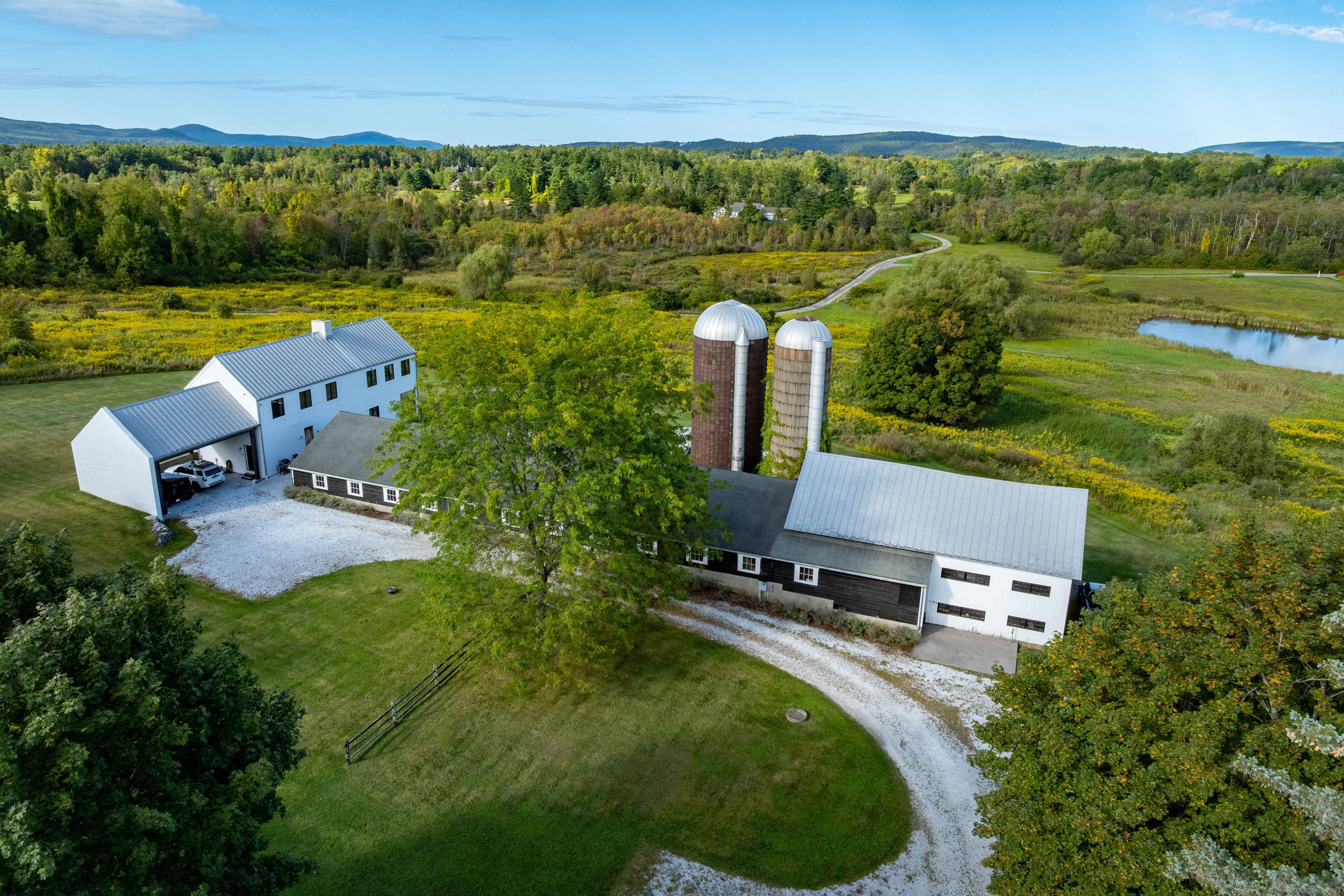 Meticulously designed modern farmhouse set on 10.