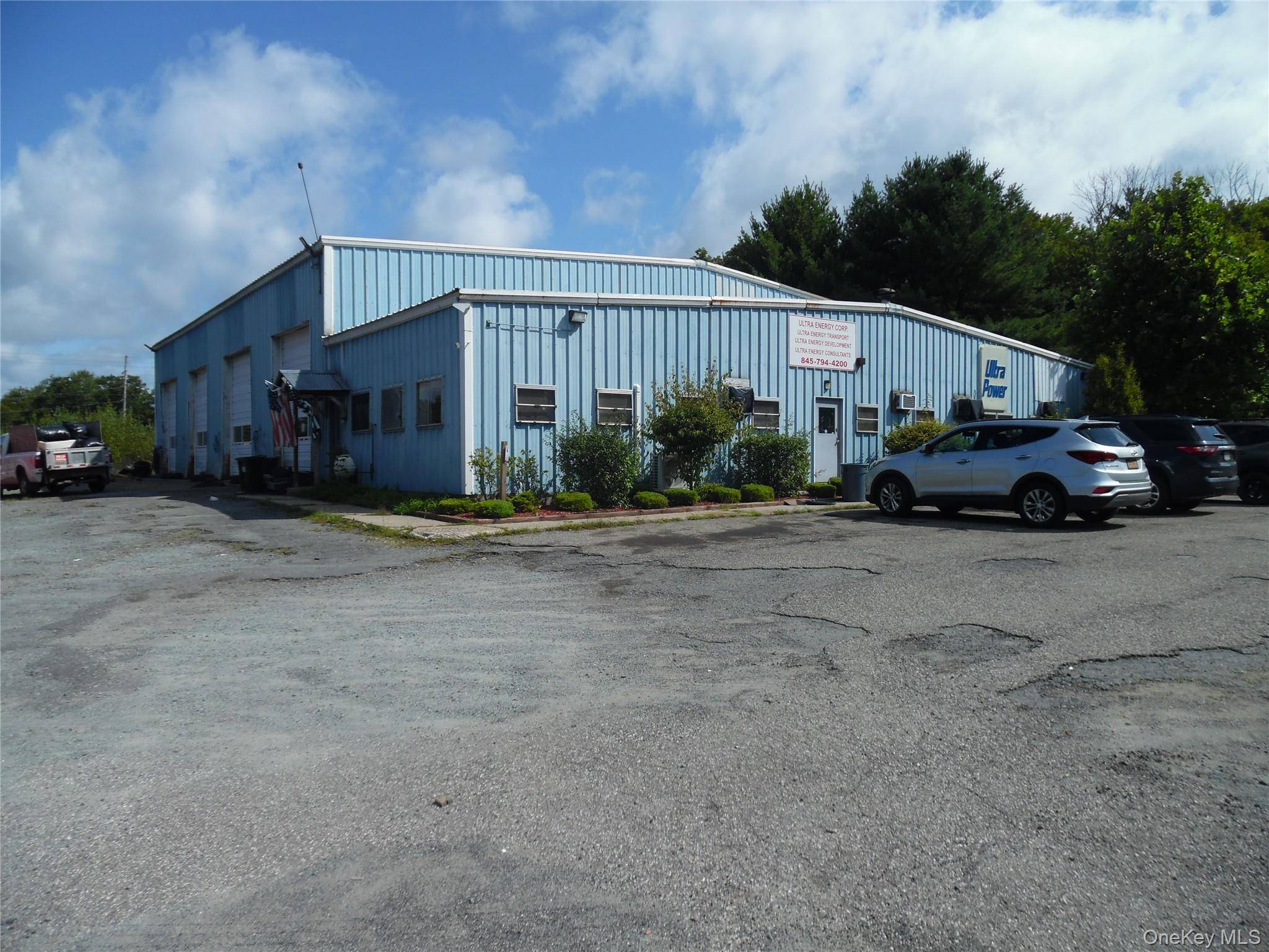There is an 7, 200 sq ft insulated metal warehouse with about 2000 sq ft of office space, 800 sq ft of which is being rented.
