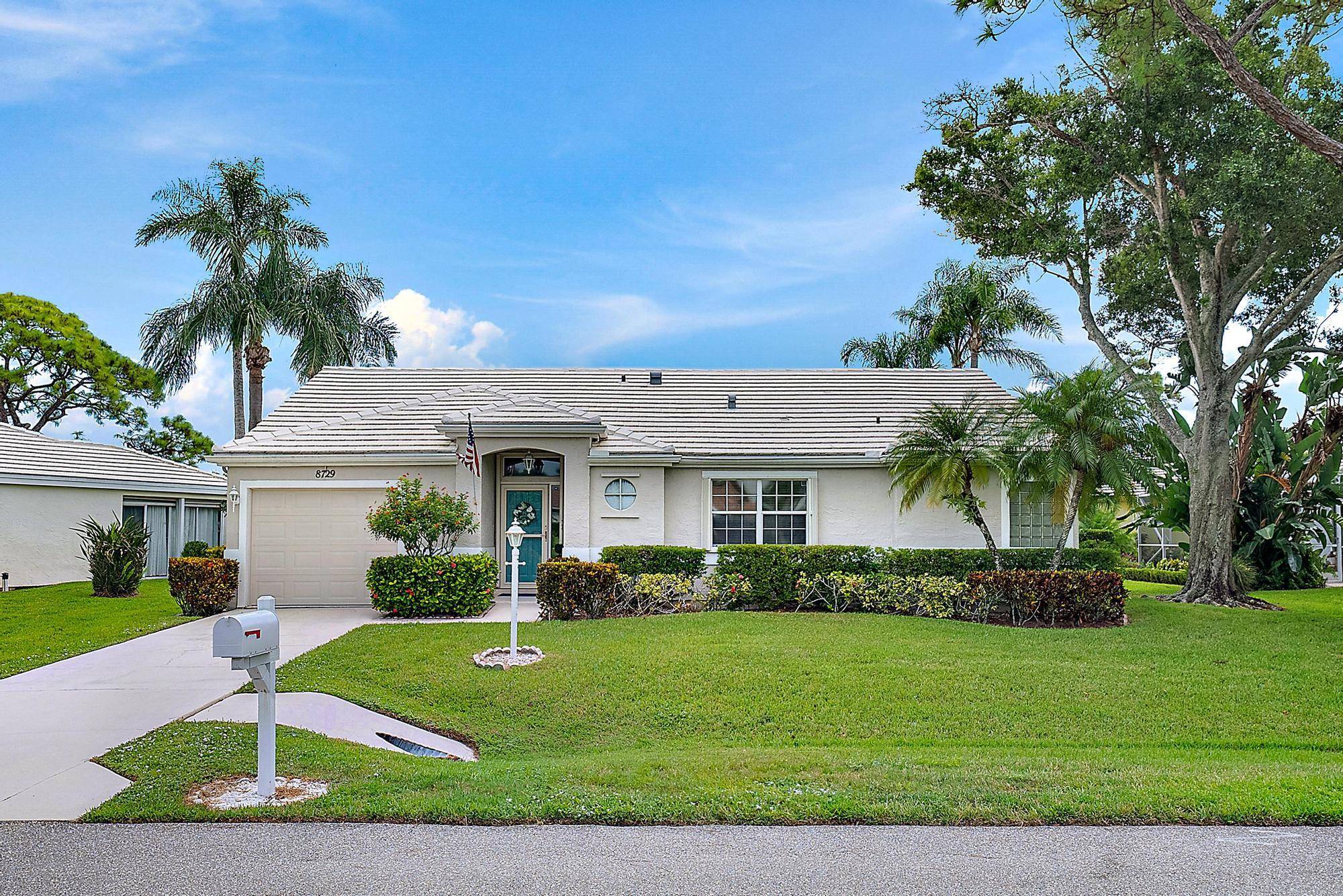 This charming home is perfectly situated on an oversized golf course lot in the highly desirable North Passage community, nestled along the scenic Loxahatchee River.