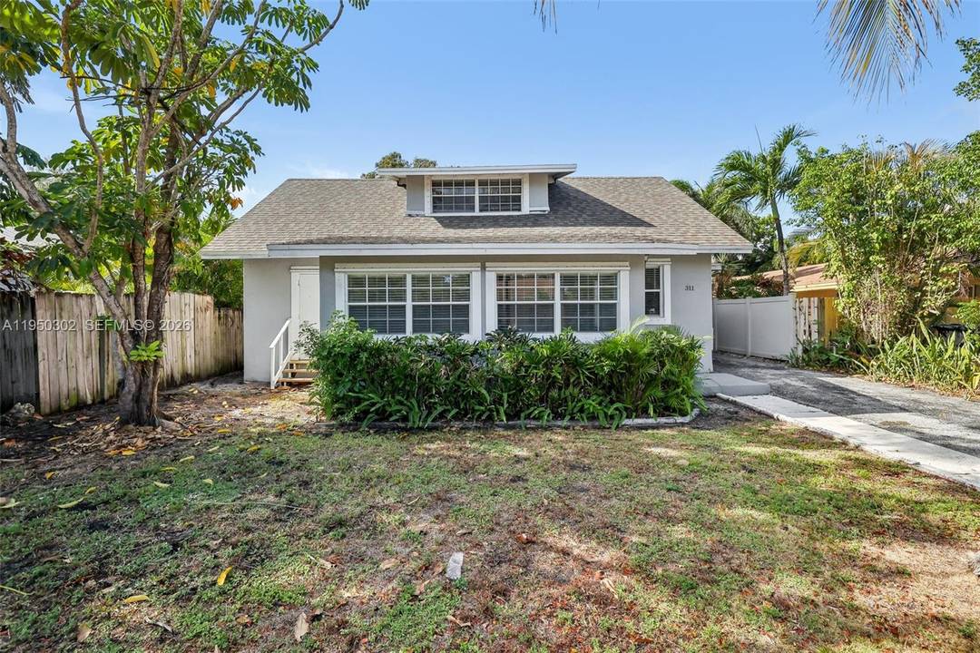 Spacious 2 story home in Palm Beach featuring 5 bedrooms and 3.