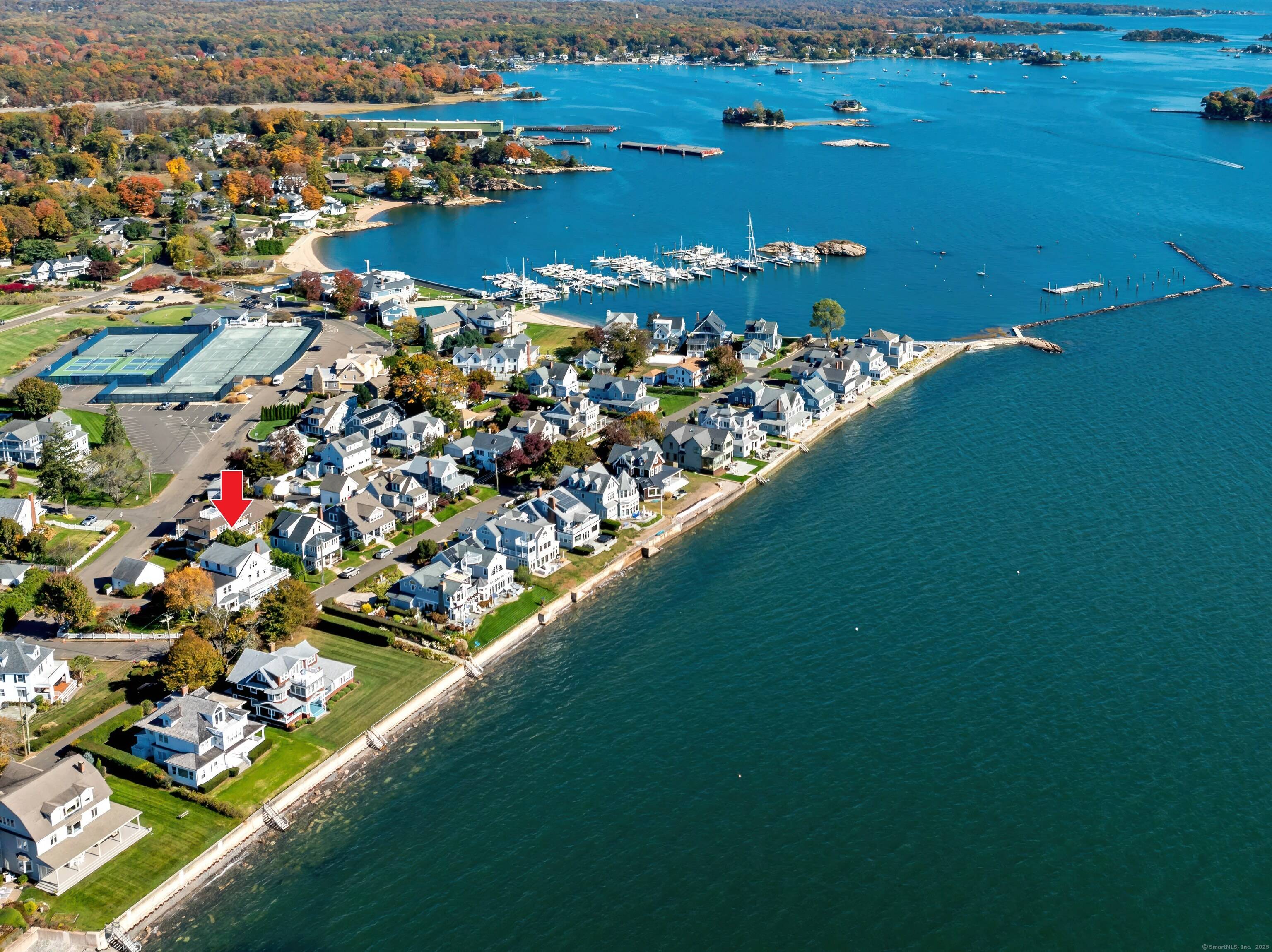 Coastal Elegance with Modern Upgrades 10 Island View Avenue is set on a beautifully landscaped double corner lot just a quick golf cart ride to the prestigious Pine Orchard Yacht ...