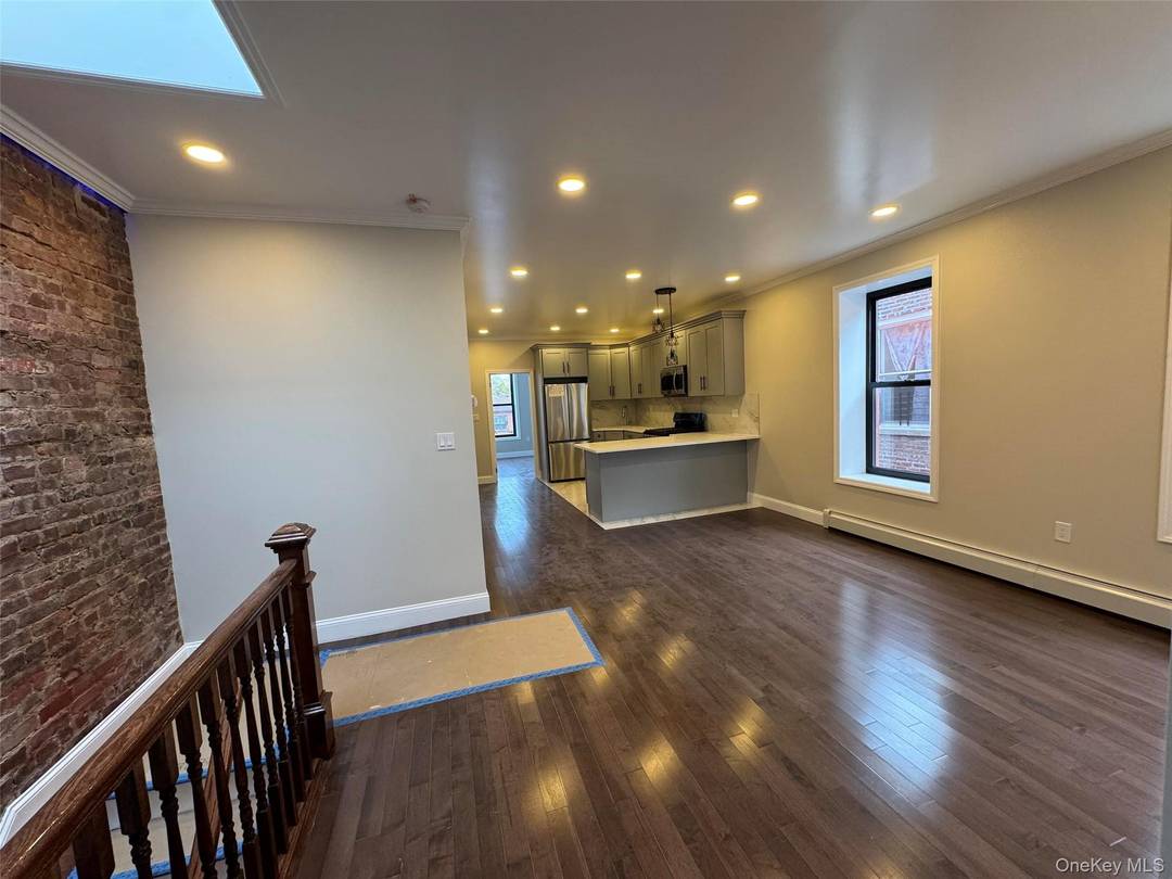 Huge Fully Renovated Legal detached 2 family with shared driveway and 2 car garage Brick House on very nice block and close to everything.