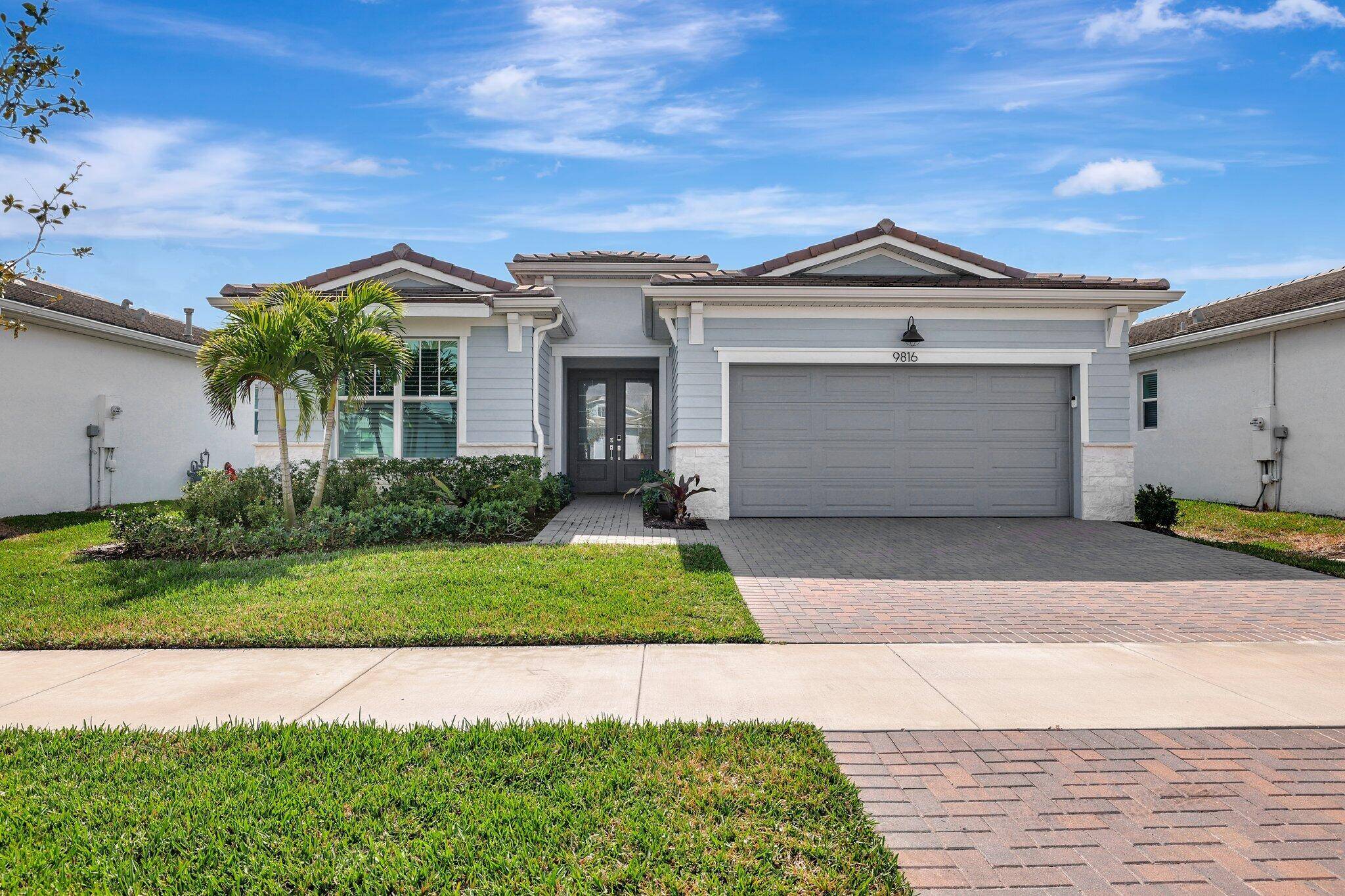 Experience luxury living in this beautifully upgraded Clarion Model home in Telaro, Port St.