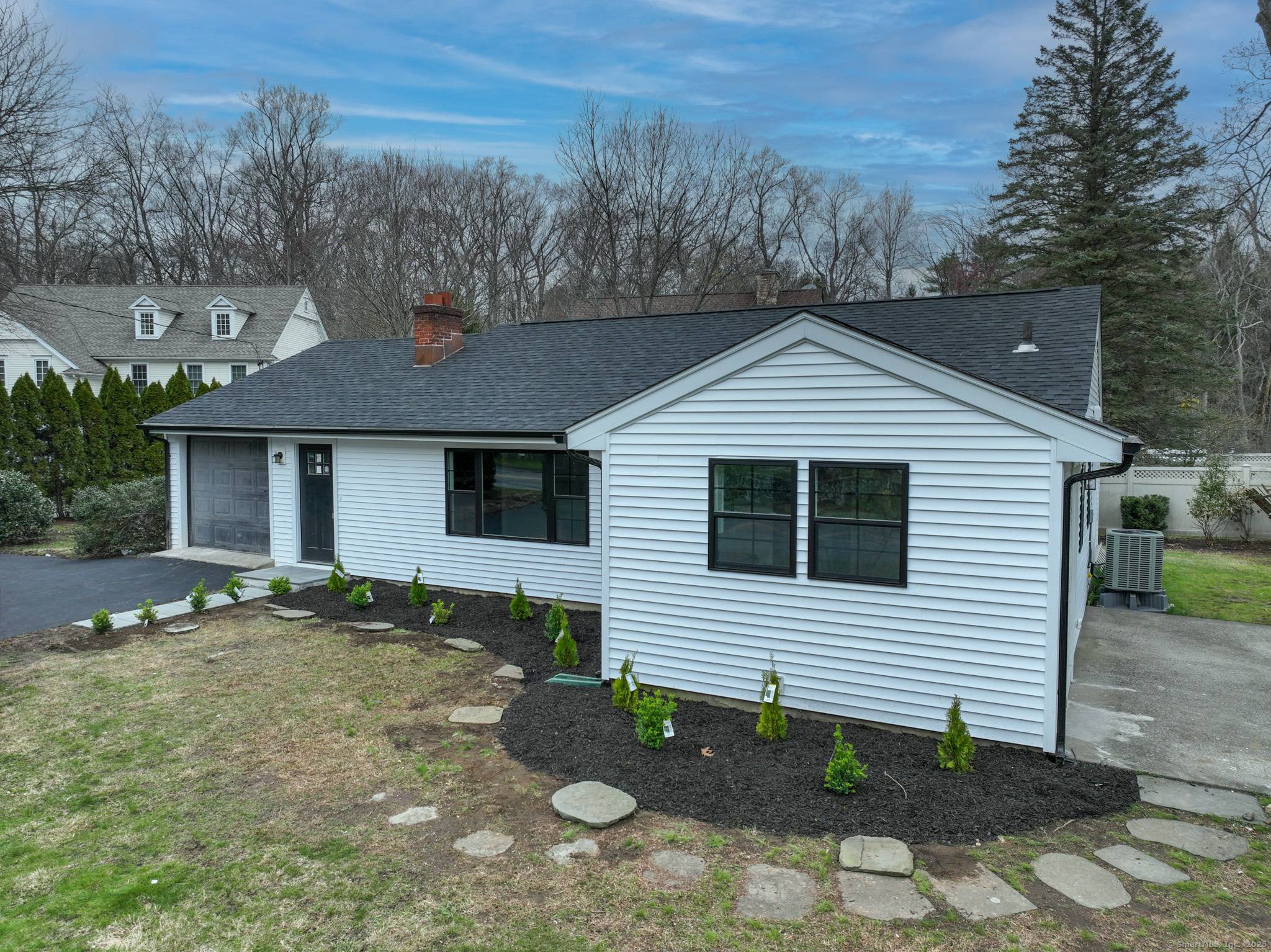 Welcome to 101 Parade Hill, a masterpiece of modern design in the prestigious town of New Canaan, CT.