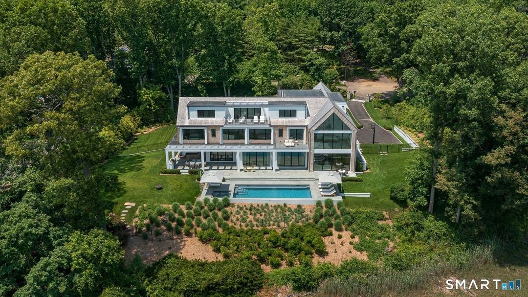 Like new custom modern home with open concept living designed for comfort and entertaining.