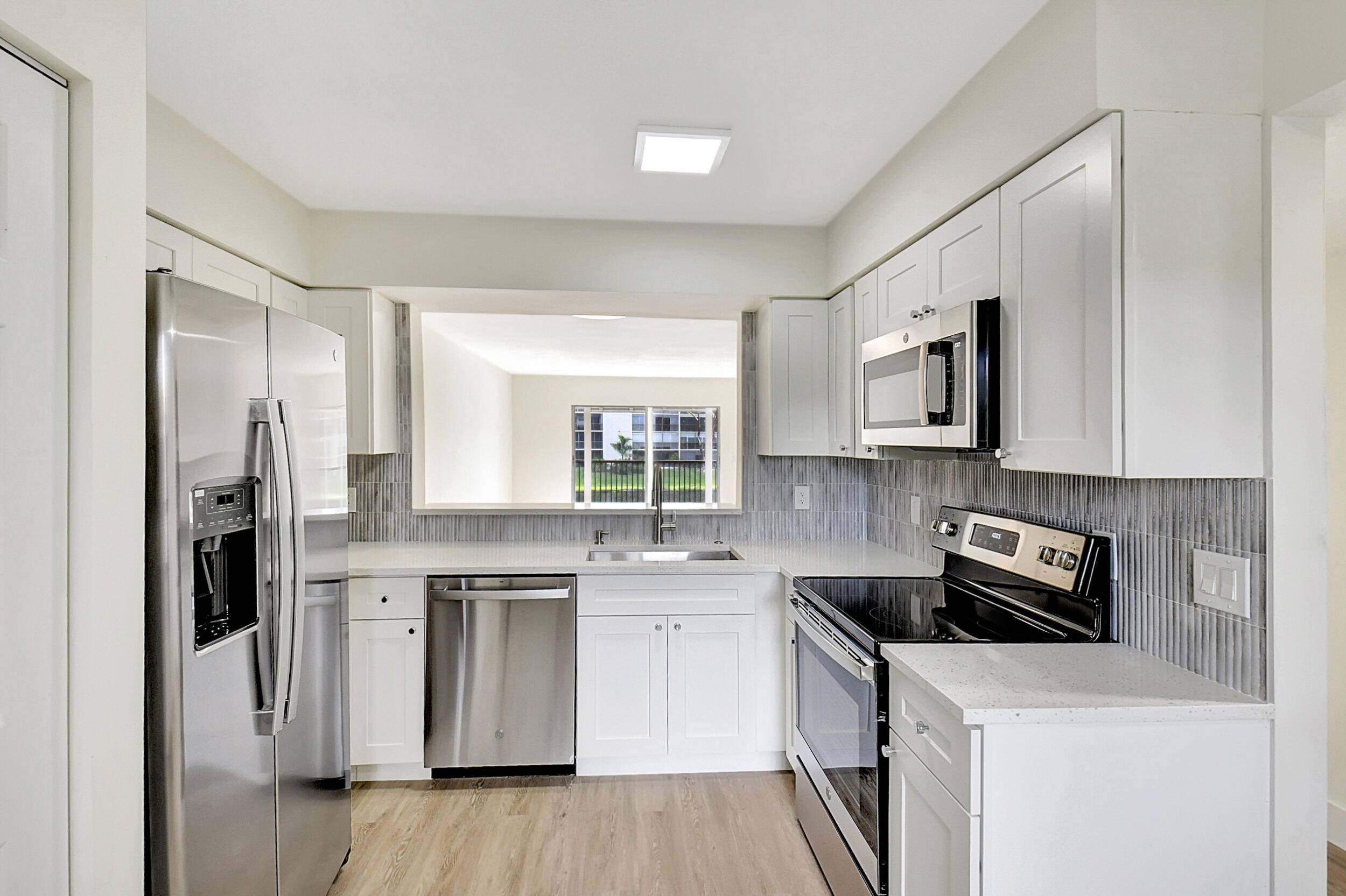 MOVE IN READY ! Completely renovated with a bonus room, and 2 full bathrooms with a water view to wake up and enjoy your morning coffee.