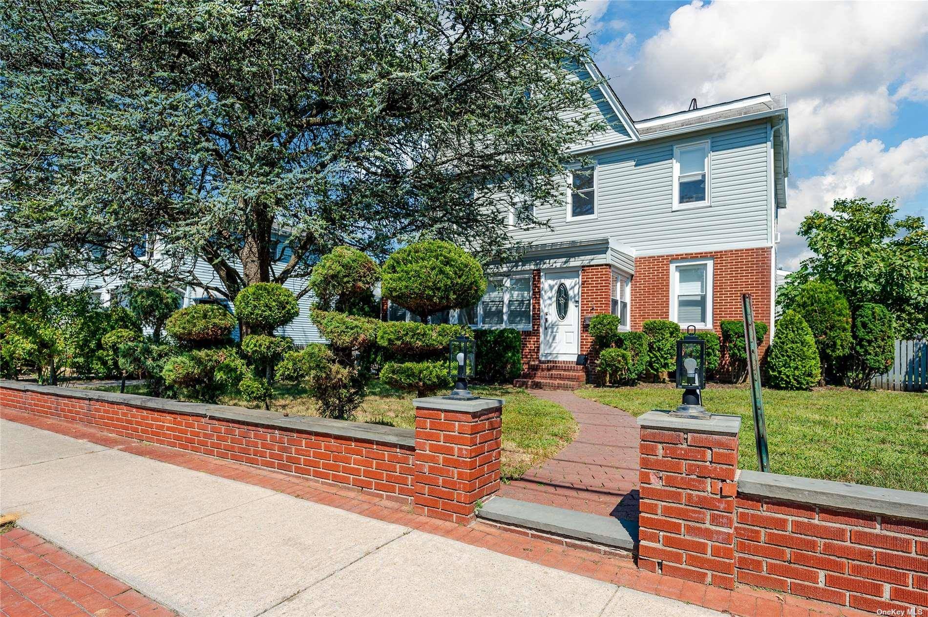 Live Large in the Heart of School District 14 Renovated 5 Bedroom Beauty with Bonus Space !