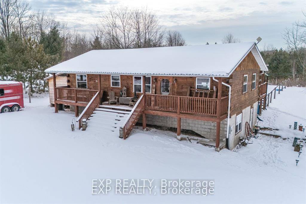 A little slice of heaven nestled on 29 acres, and surrounded by forest, sits this handcrafted log home with it's rustic beauty and timeless charm.