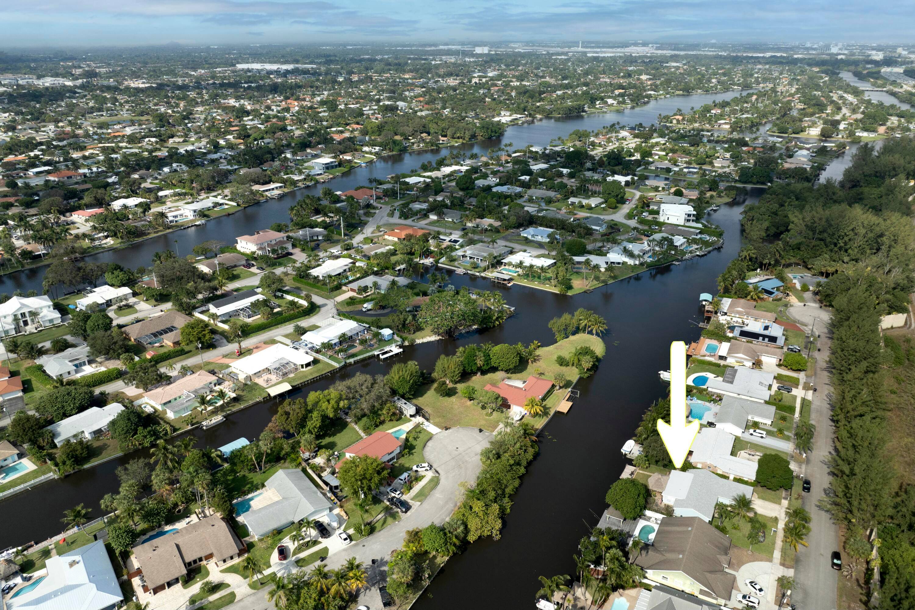 WATERFRONT with SEAWALL, DOCK, BOAT LIFT, TIKI, REMODELED, NEW ROOF IN 2022.