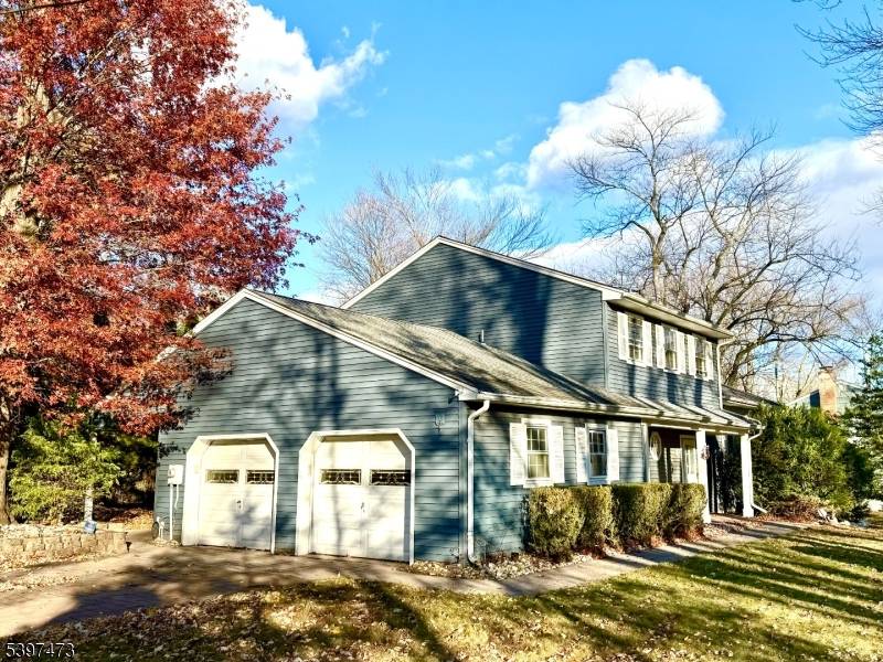 This stylish, distinctive 5 bedroom home sits in a coveted neighborhood.