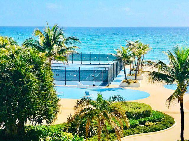 Direct Ocean front private family friendly residence featuring panoramic ocean views and wrap around balcony !