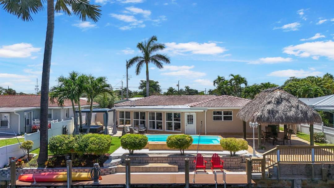 Welcome to this beautifully updated home offering a seamless blend of comfort, style, and true South Florida waterfront living.