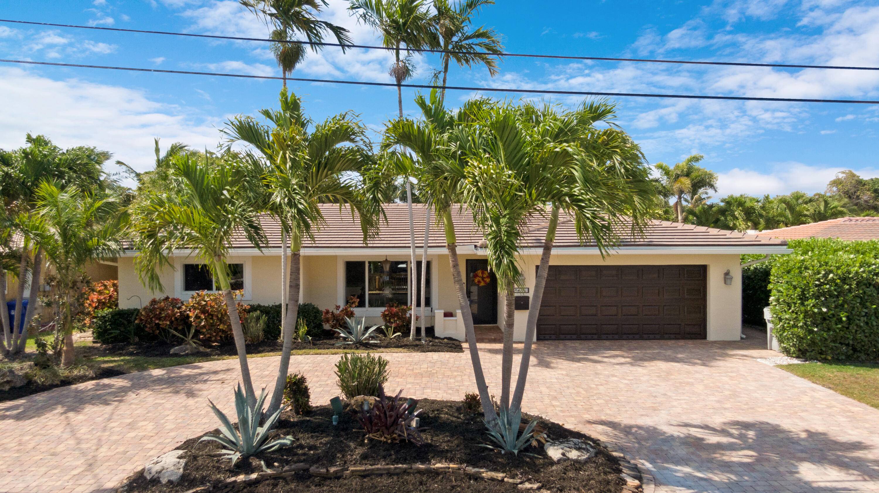 Welcome to this exceptional 3 bedroom, 2 bathroom deepwater home in sought after Pompano Isles, featuring 75 feet of waterfront with no fixed bridges a boater's dream.