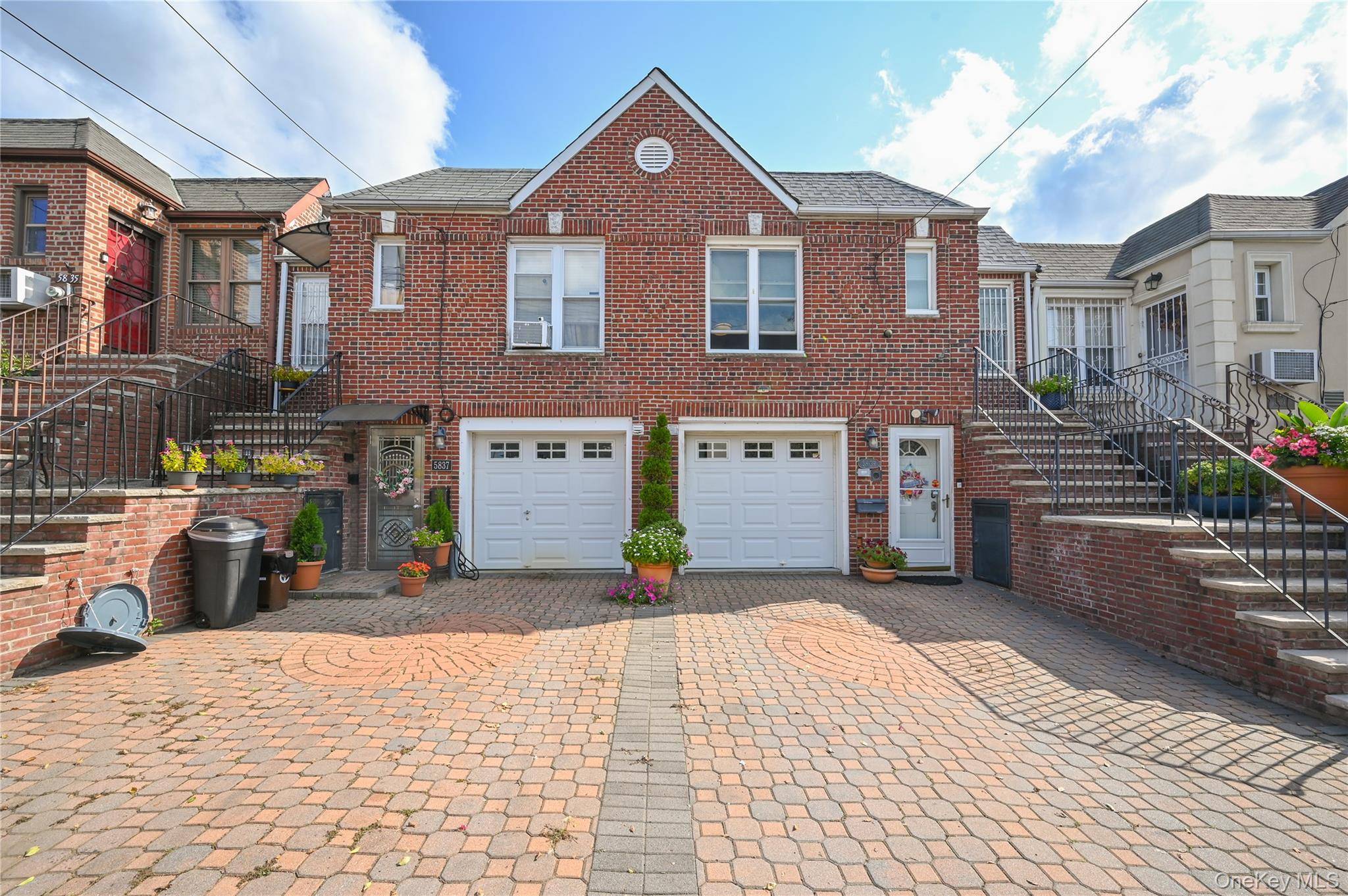 Just hit the market ! Middle Village attached one family home featuring 2 bedrooms and 2 full bathrooms.