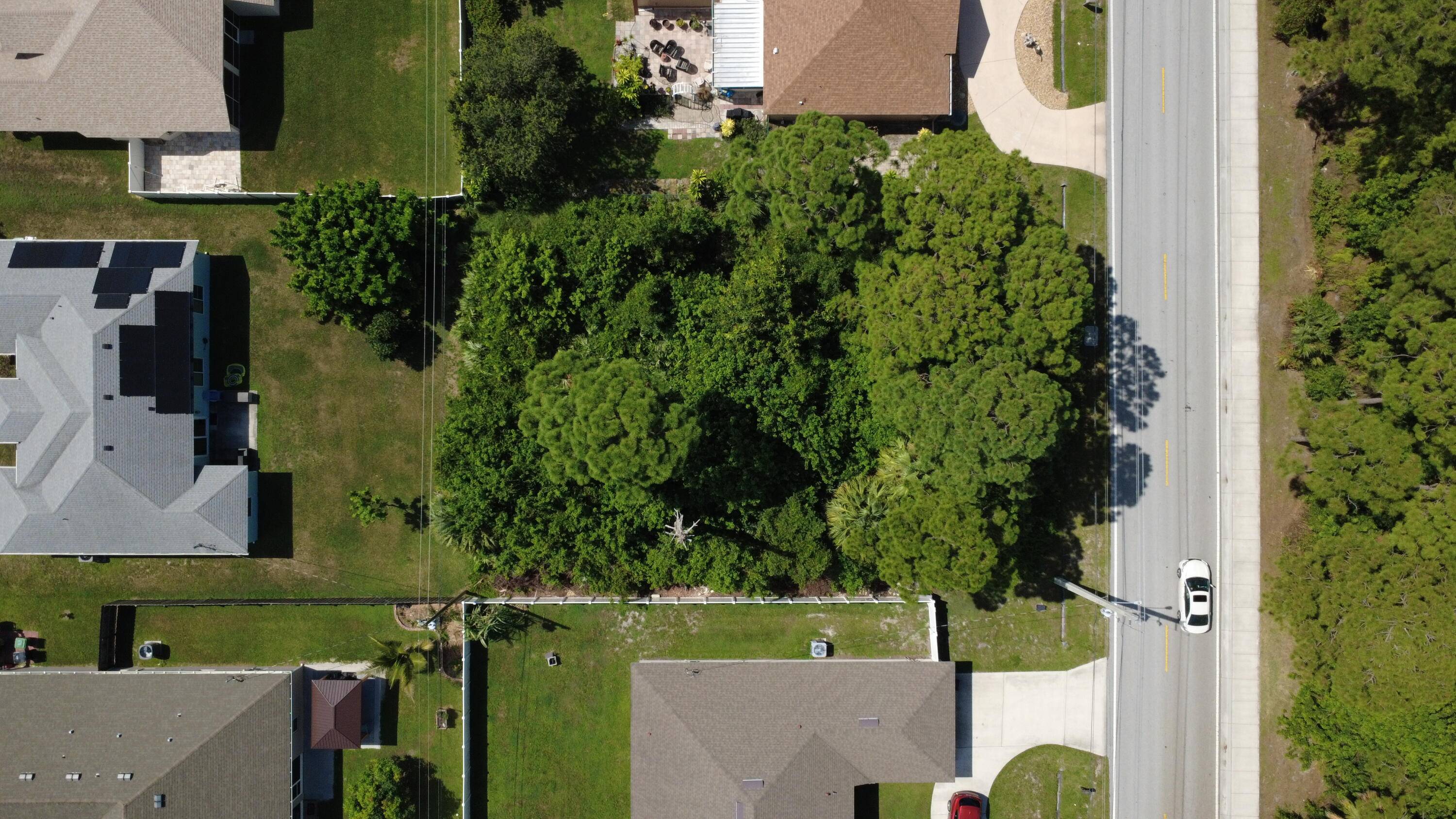 Discover the perfect opportunity to build your dream home on this spacious vacant lot located at 3873 SW Rosser Boulevard, Port Saint Lucie.