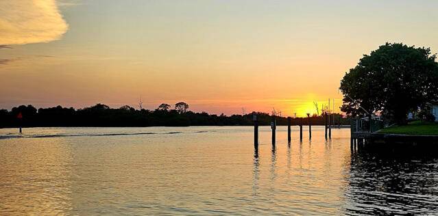 NOW'S your chance to own this COZY WATERFRONT PARADISE !