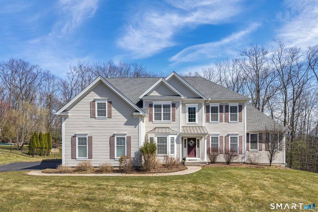 Offered for the first time, this contemporary colonial home blends modern luxury with timeless design.