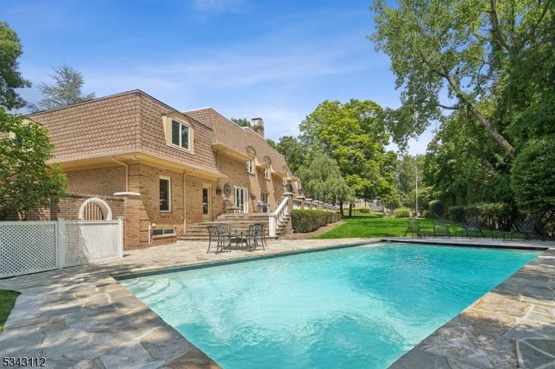 Welcome to 425 Saddle Back Trail, a stunning 7 bedroom, 6.