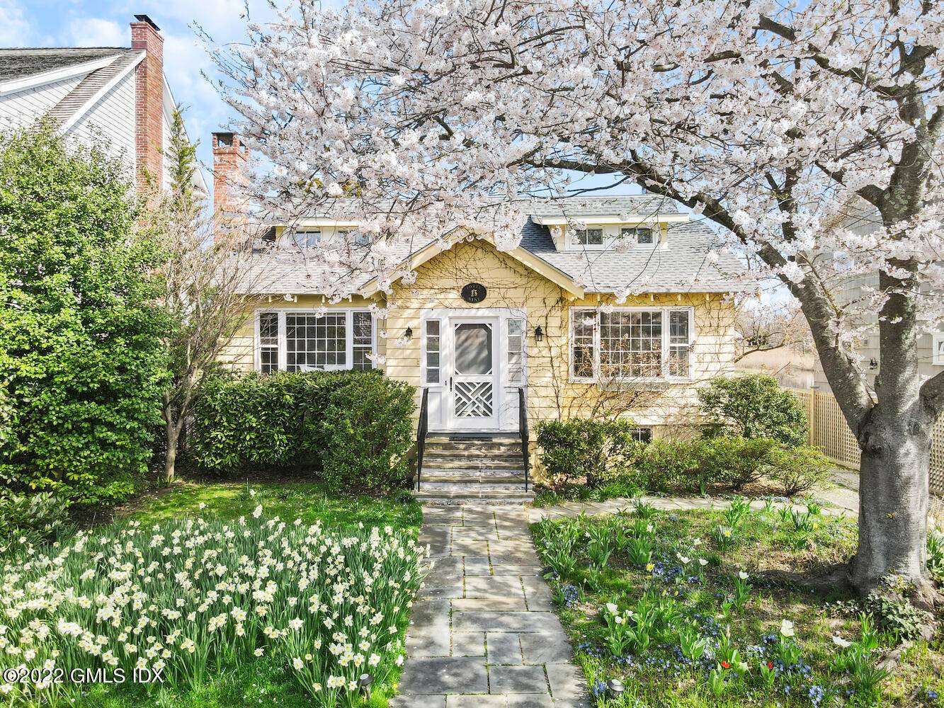 Enjoy captivating views across the picturesque tidal saltwater inlet, rich with native wildlife in this classic Old Greenwich home.