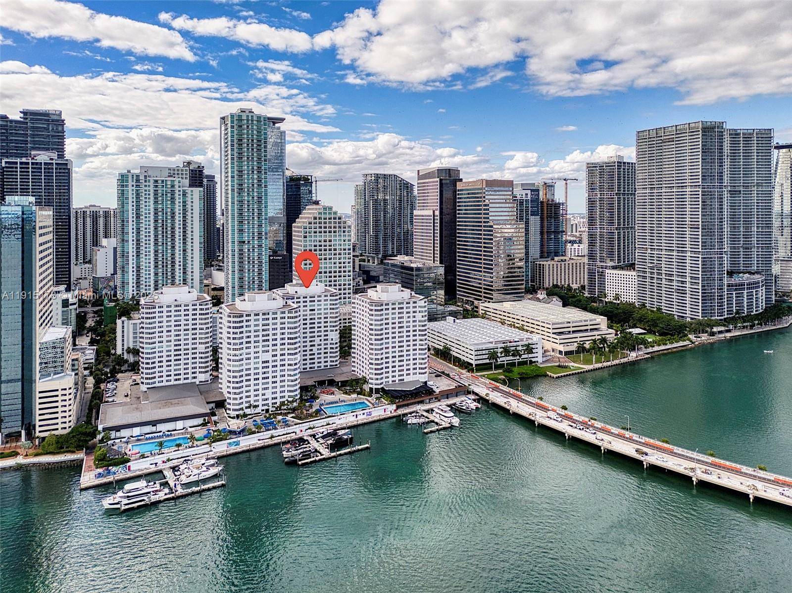 Open concept unit in one of Brickell s most iconic buildings, offering wide open water views from all front facing windows.