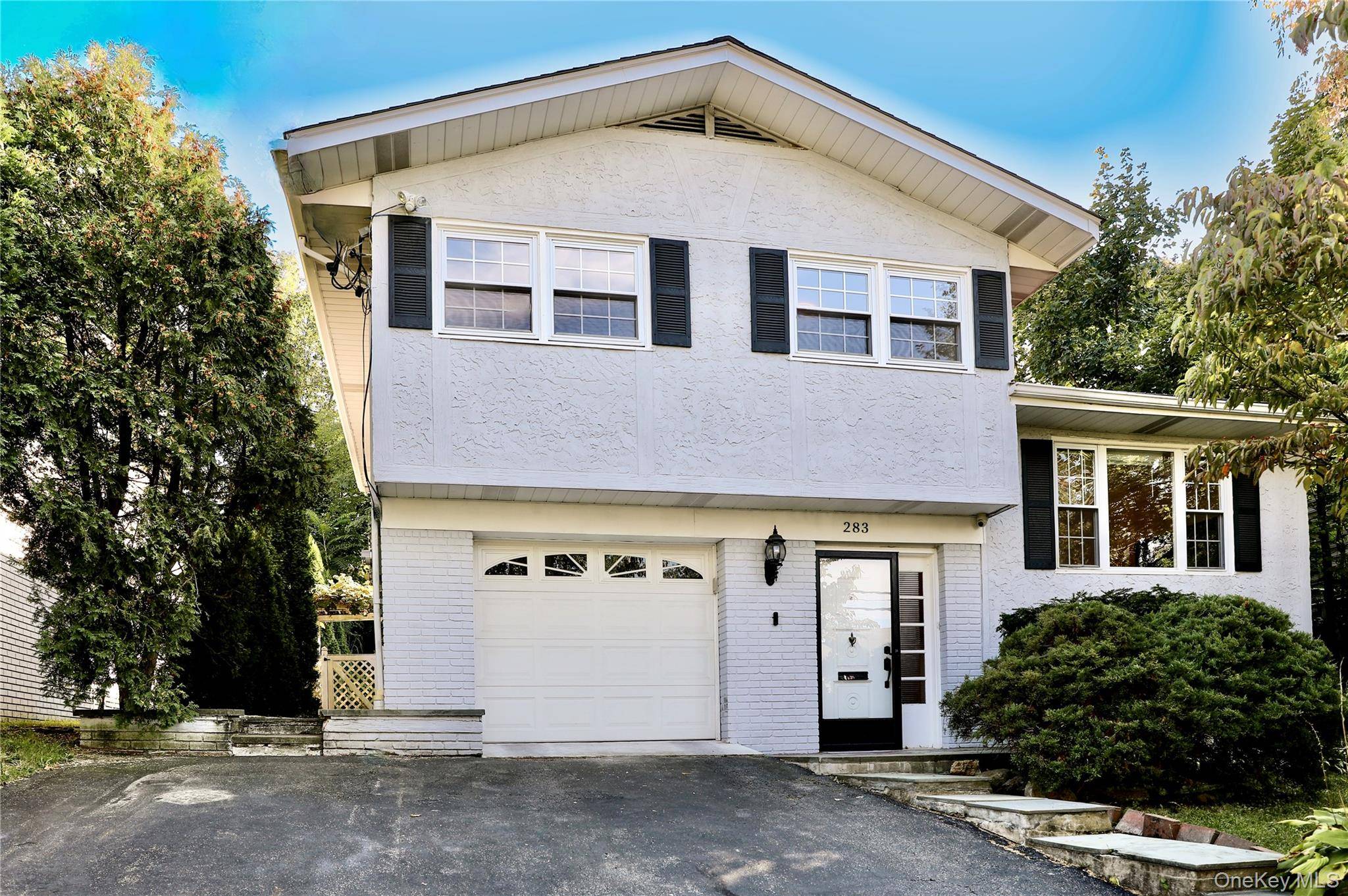 A wonderful opportunity to move right into this beautiful 4 bedroom, 2 bath home perfectly located in Rye Brook within 1.