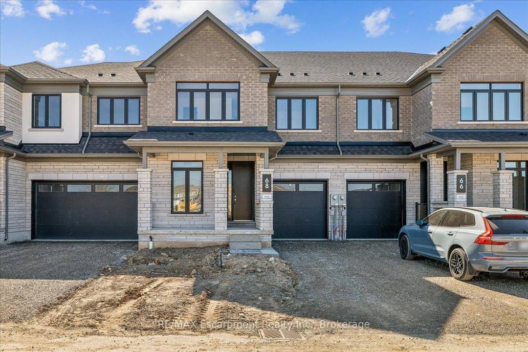 Stunning brand new freehold 4 bedroom townhome backing onto a ravine with a walk out basement in east Waterdown.