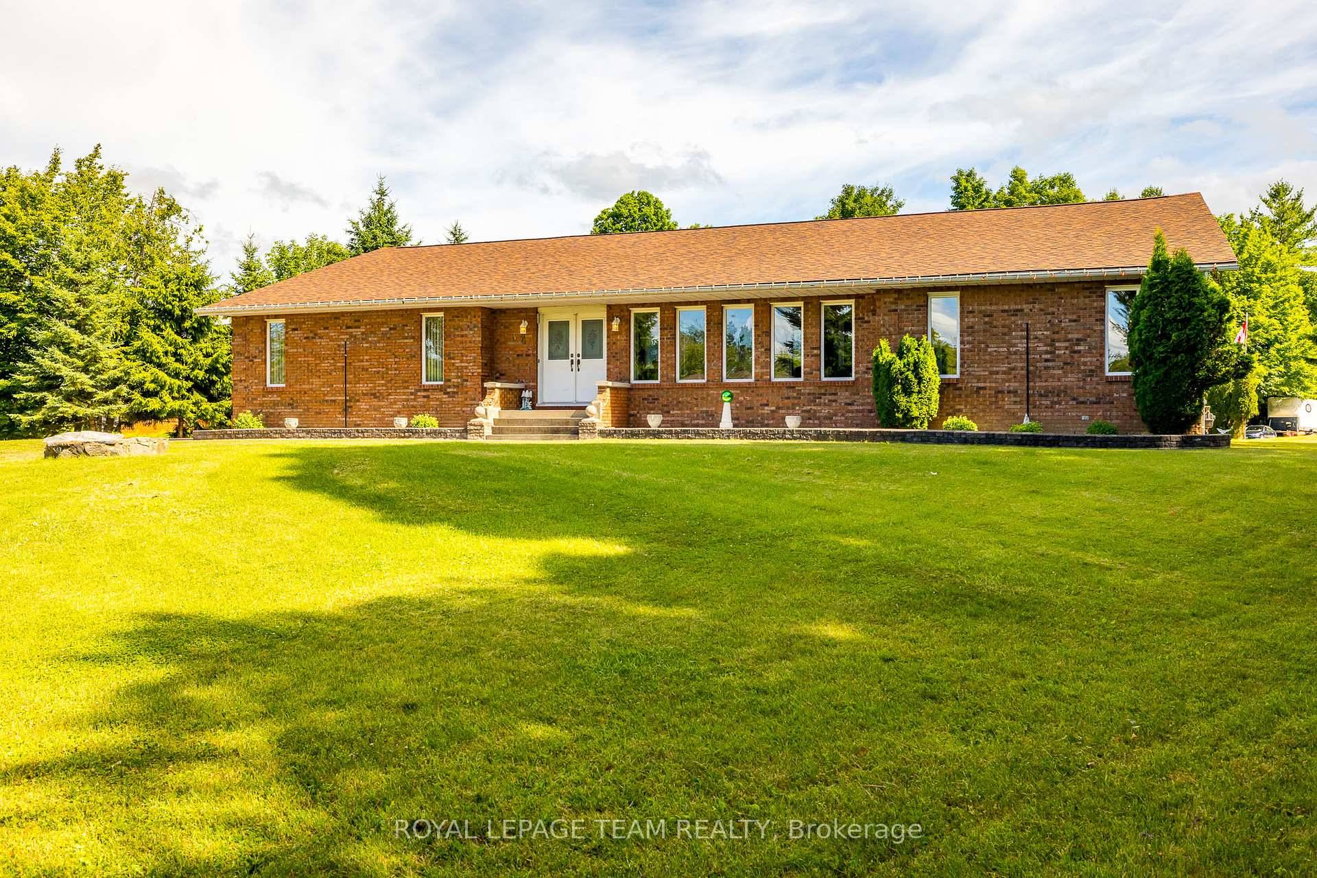 Custom 2, 541 Sq Ft All Brick Bungalow above grade, on a nearly 2 acres property perfect for Contractors amp ; Entertainers alike !