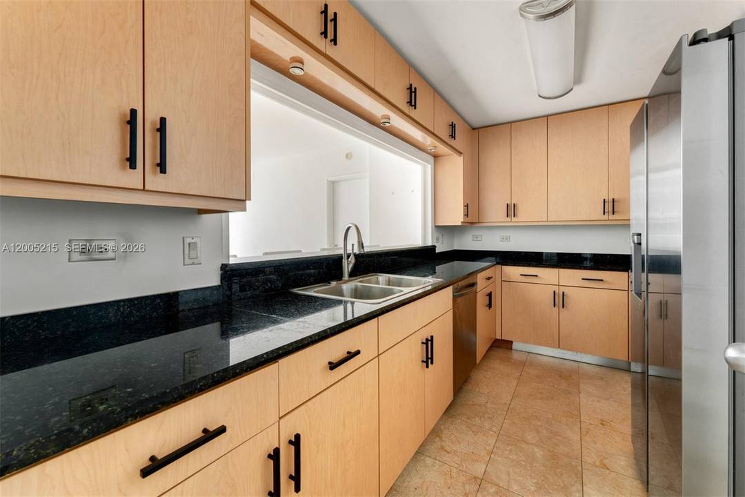 Charming and elegant 3 bedroom, 3 bath residence in The Courts at Brickell Key, offering serene bay views and a beautifully light filled interior.
