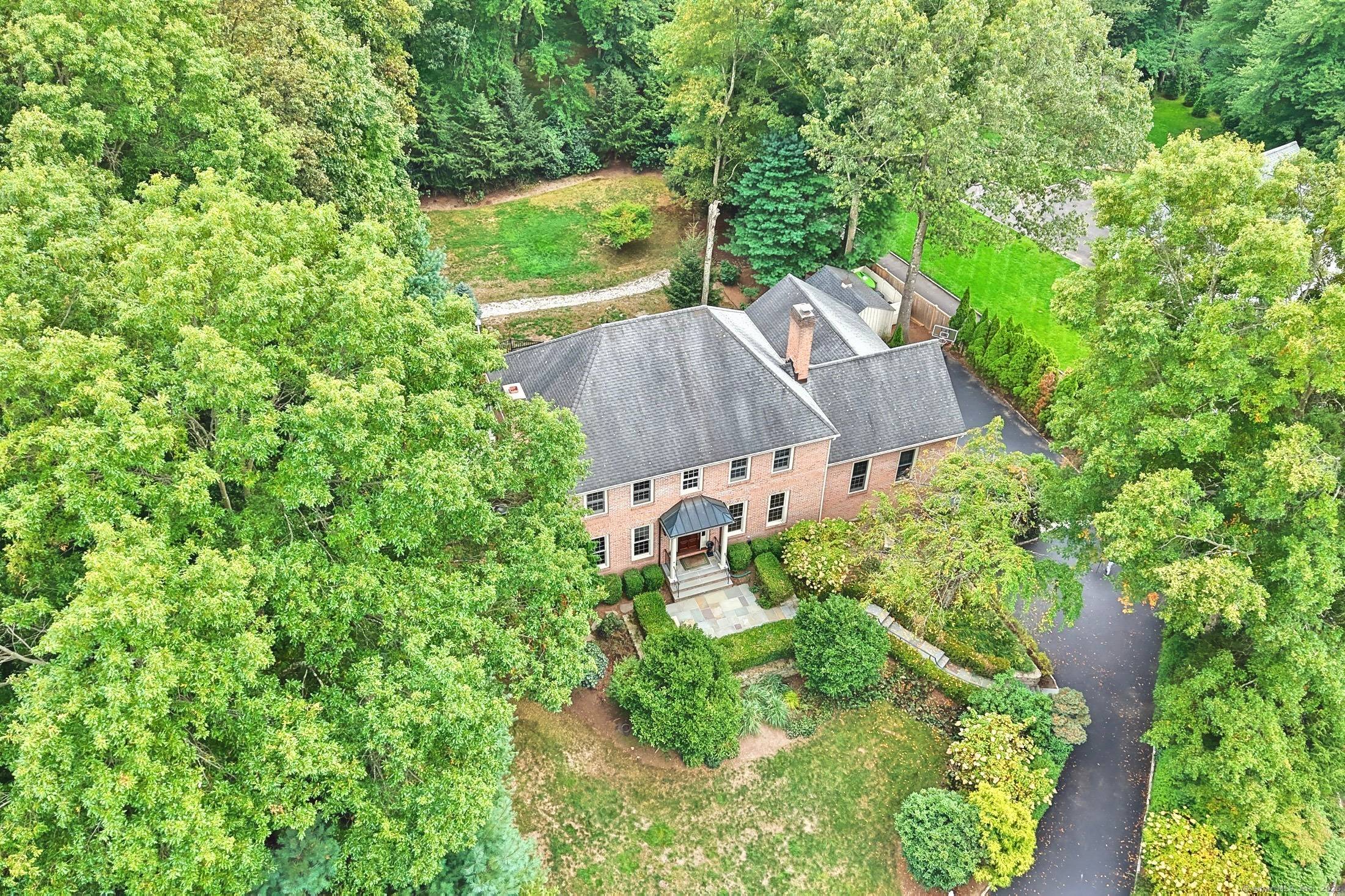 254 Sherwood Farm Road, tucked away at the end of a cul de sac in the desirable lower Greenfield Hill section of Fairfield, this stately brick Colonial blends timeless curb ...