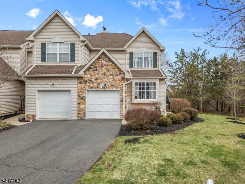 Captivating 3 BR, 2. 5 BA end unit townhome with one car garage located in the popular Crestmont Manor development in highly sought after Hillsborough Township.