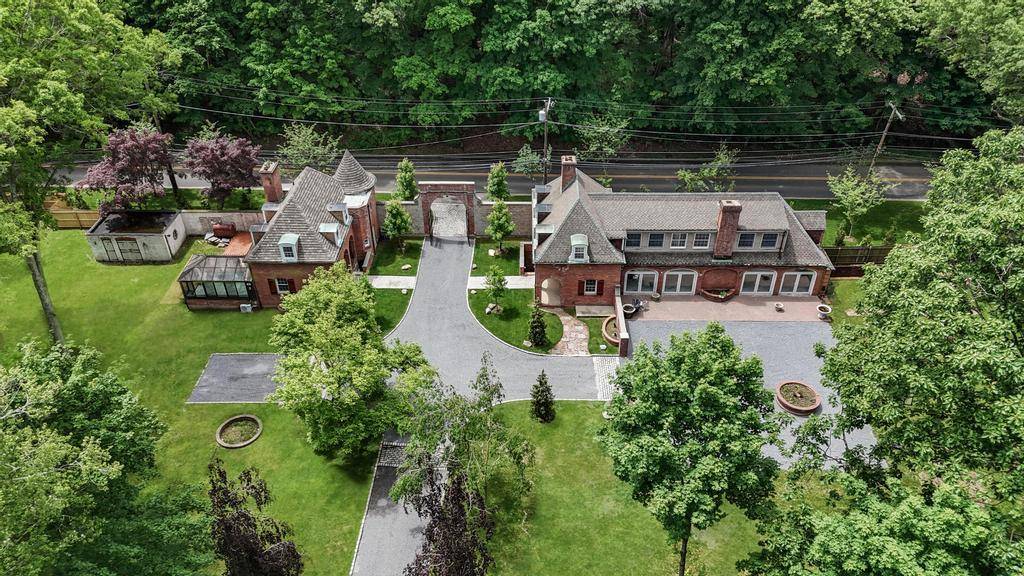 Once a stately Carriage House, this beautifully reimagined main residence seamlessly blends historic character with modern comfort.