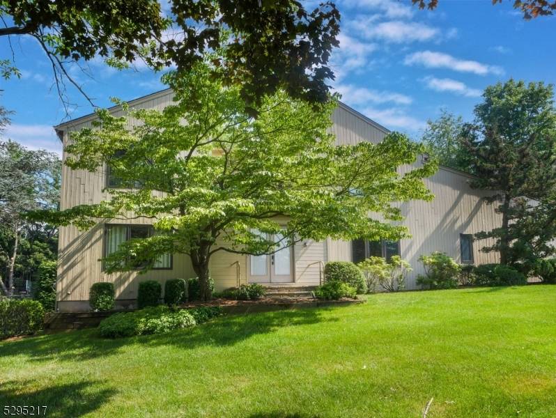 Discover this custom 5 bedroom, 2.