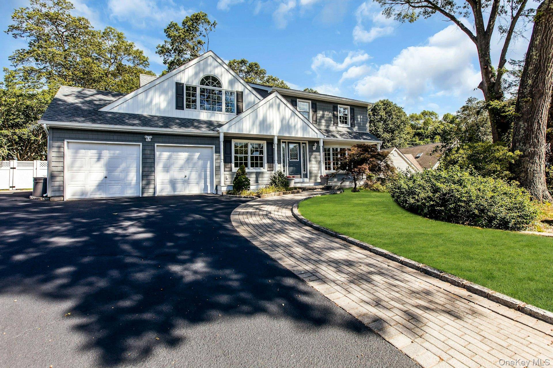 THIS 4 BDRM 3 BATH COLONIAL SITS ON APPROX 200 X 100 MID BLOCK CUL DE SAC.