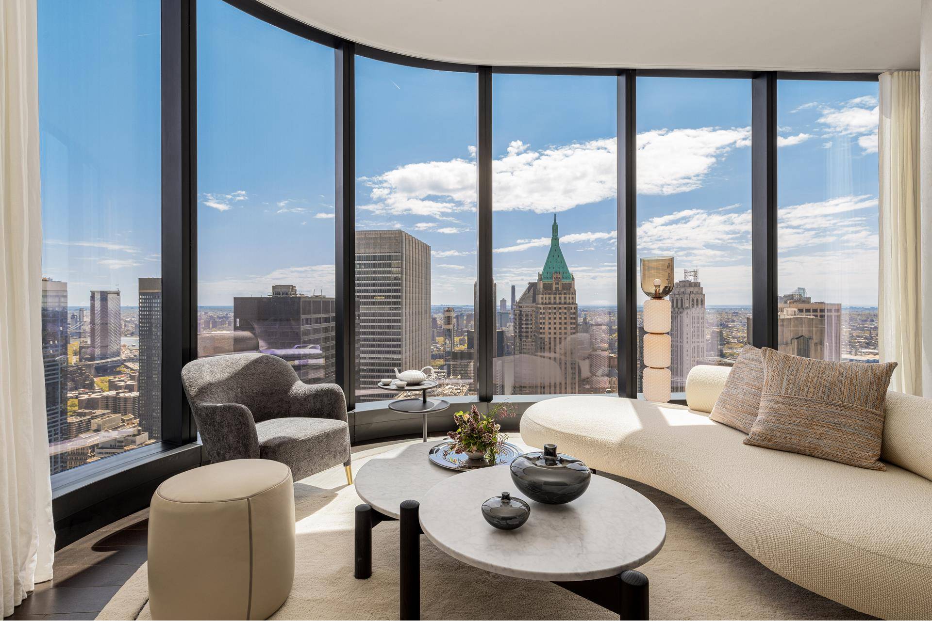 Welcome to Residence 50A at The Greenwich by Rafael Vi oly, where elevated living meets unparalleled views.