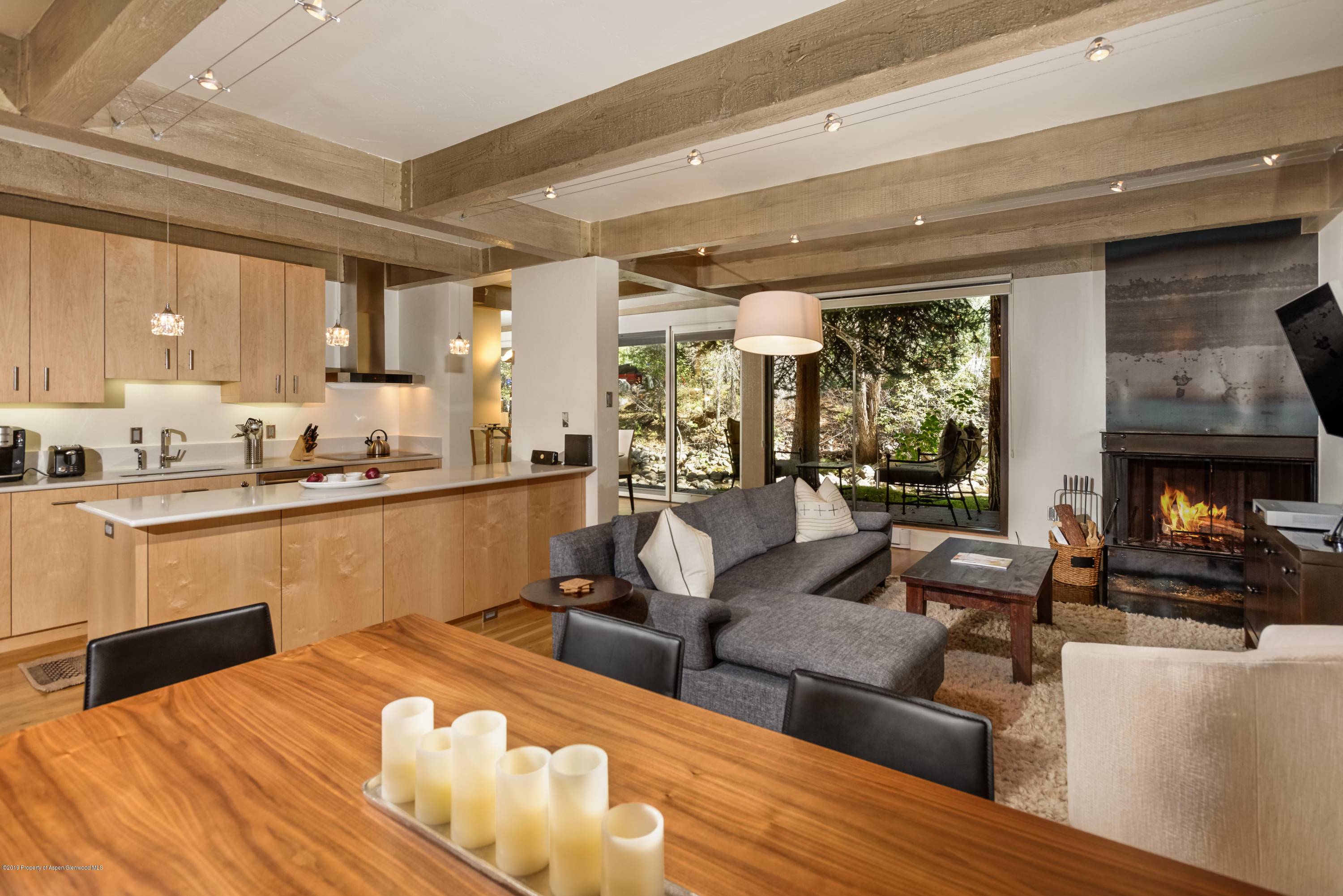 Beautifully remodeled two bedroom, two bath riverfront condo featuring exquisite custom details throughout.
