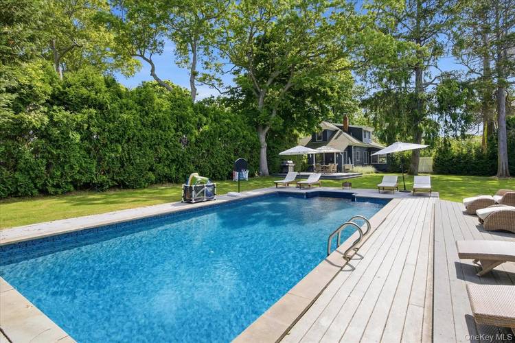 Escape to the Hamptons in this 4 bedroom, 2 bath cottage style retreat, ideally located at 255 Sunset Avenue in Westhampton Beach.