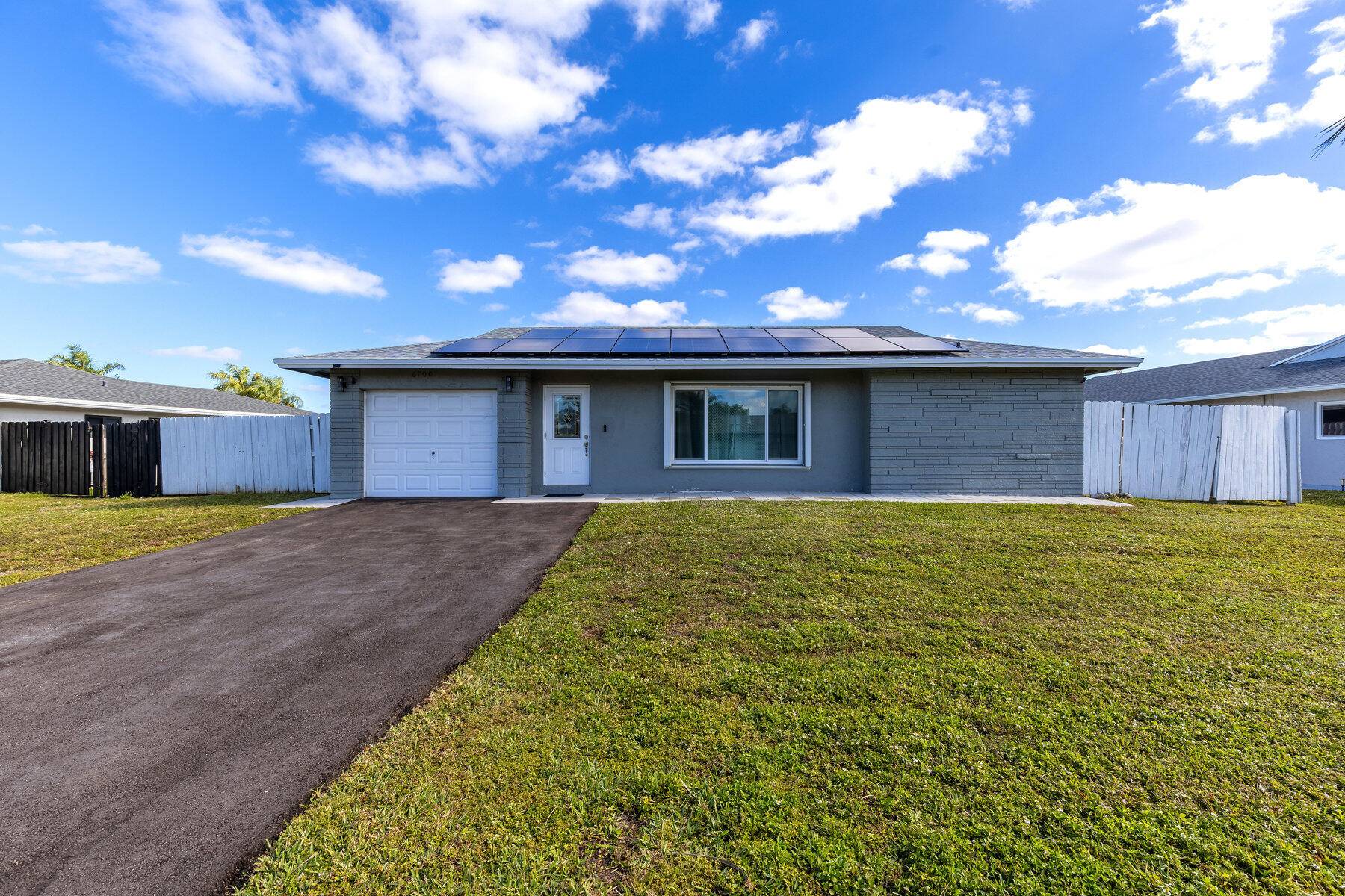 Welcome to this amazing home nestled in the heart of Tamarac, this home offers open floor plan, completely renovated, newer roof, tankless water heater, solar panels, impact widows and very ...