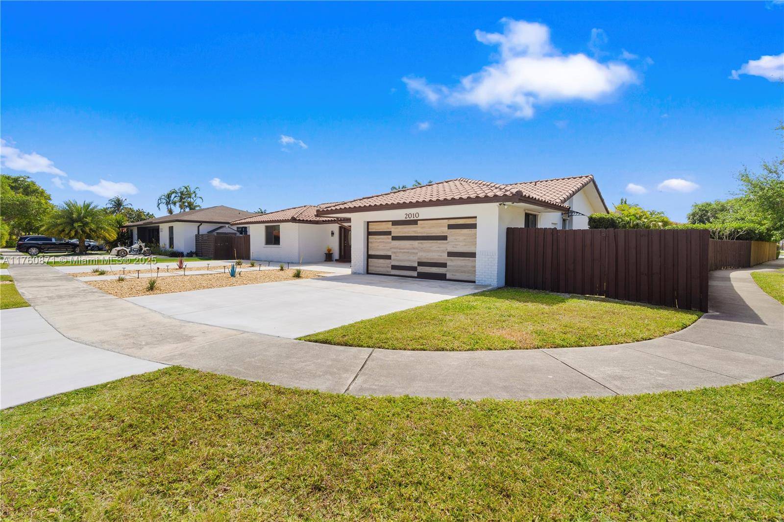 Discover this beautifully situated corner lot home in the sought after, gated Highland Lakes community, one of the best priced homes in the neighborhood.
