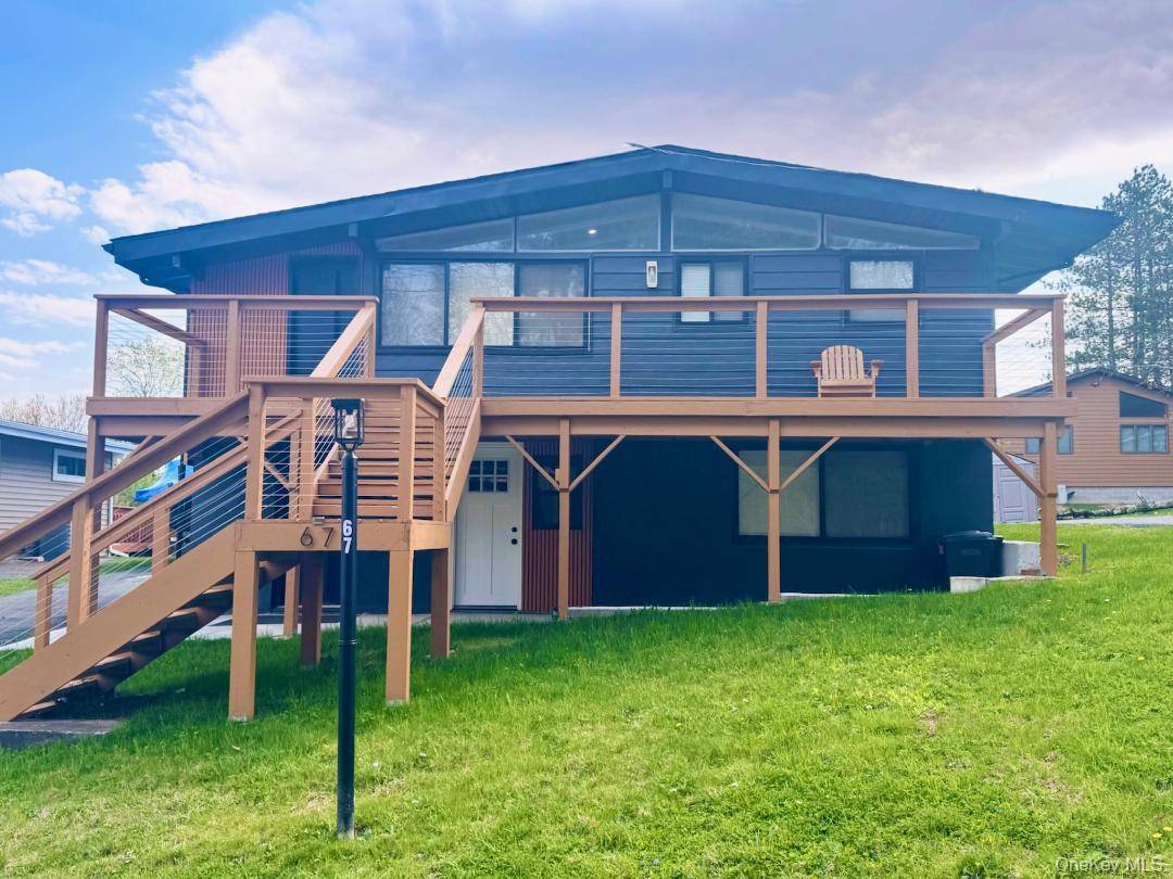 Discover the ultimate lakeside retreat in the heart of White Lake A beautifully renovated, turnkey home that offers the perfect balance of relaxation, recreation, and timeless charm.