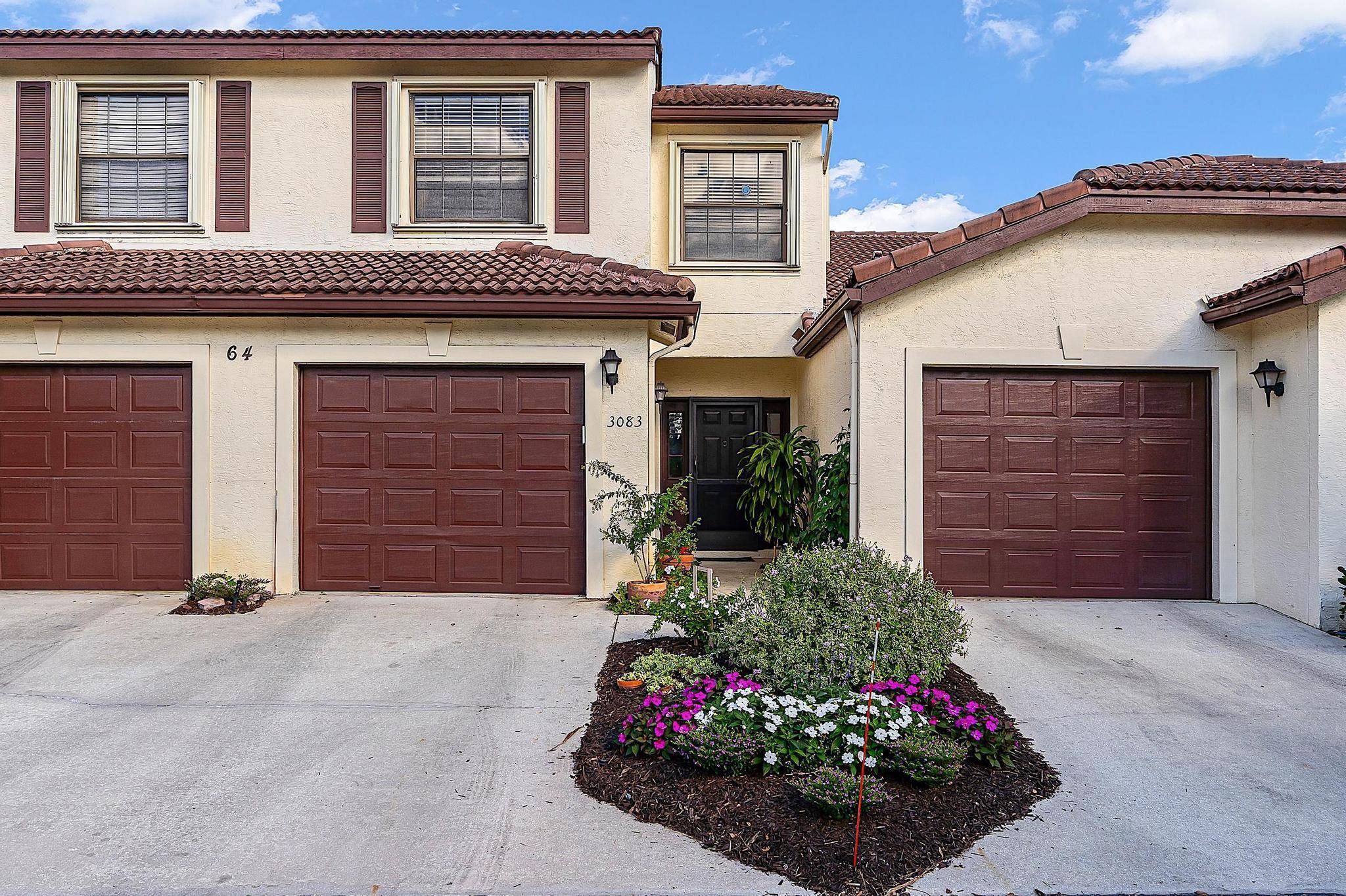 Beautiful three bedroom, two and a half bathroom townhome nestled in a sought after 55 community.