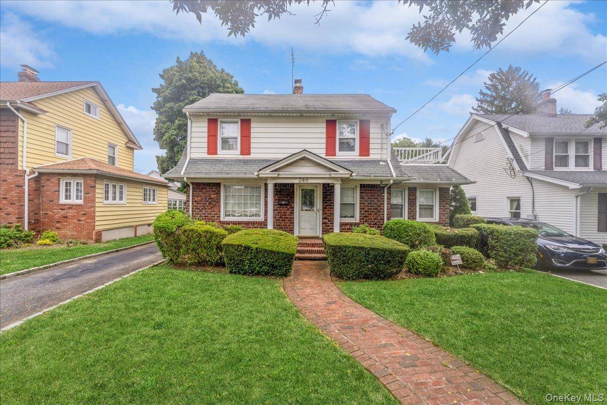 Welcome to 246 Wellington Road, a captivating Dutch Colonial home.