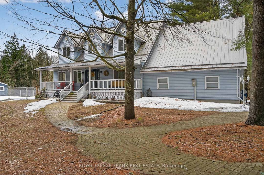 Tucked away down a winding driveway through the trees, this exceptional 8.
