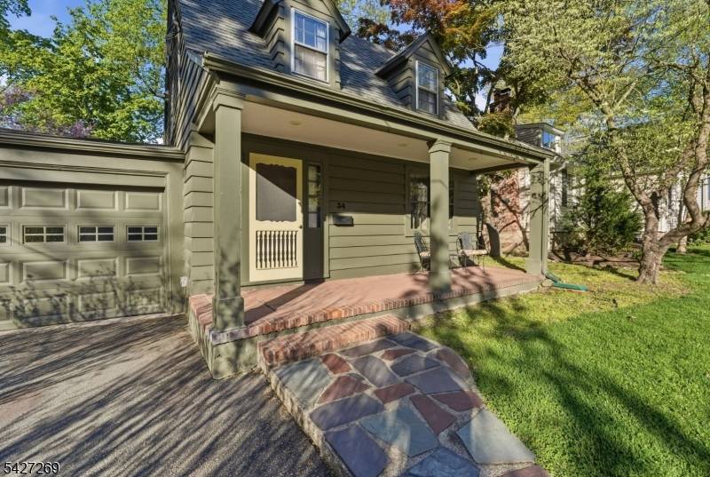 Set in a neighborhood just a block from Caldwell's town center, this Dutch Colonial offers comfort charm.
