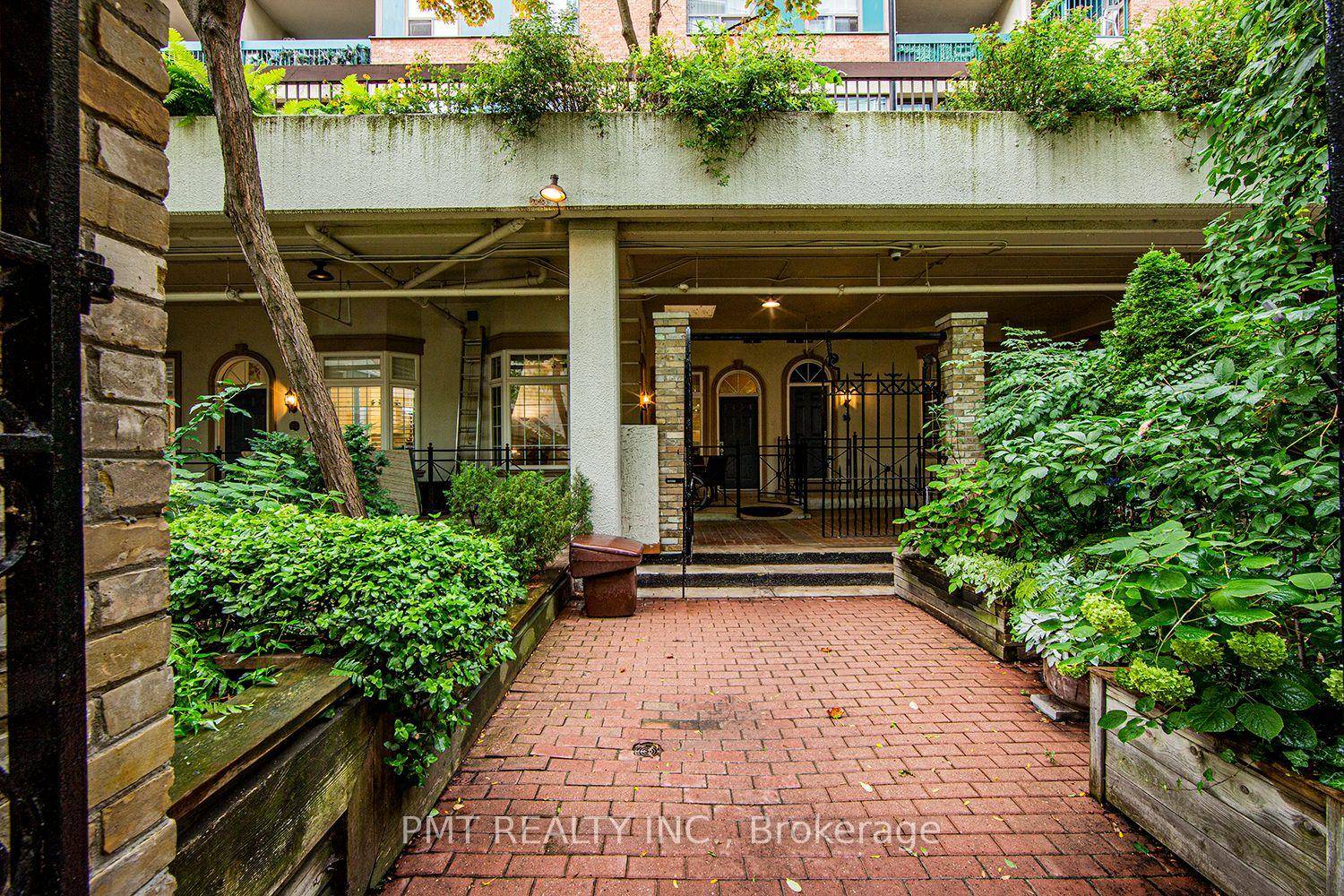 Welcome to 71 McCaul Street at Village by the Grange a rare ground level 1 bedroom, 1 bathroom unit offering a unique blend of city convenience and quiet, private living.