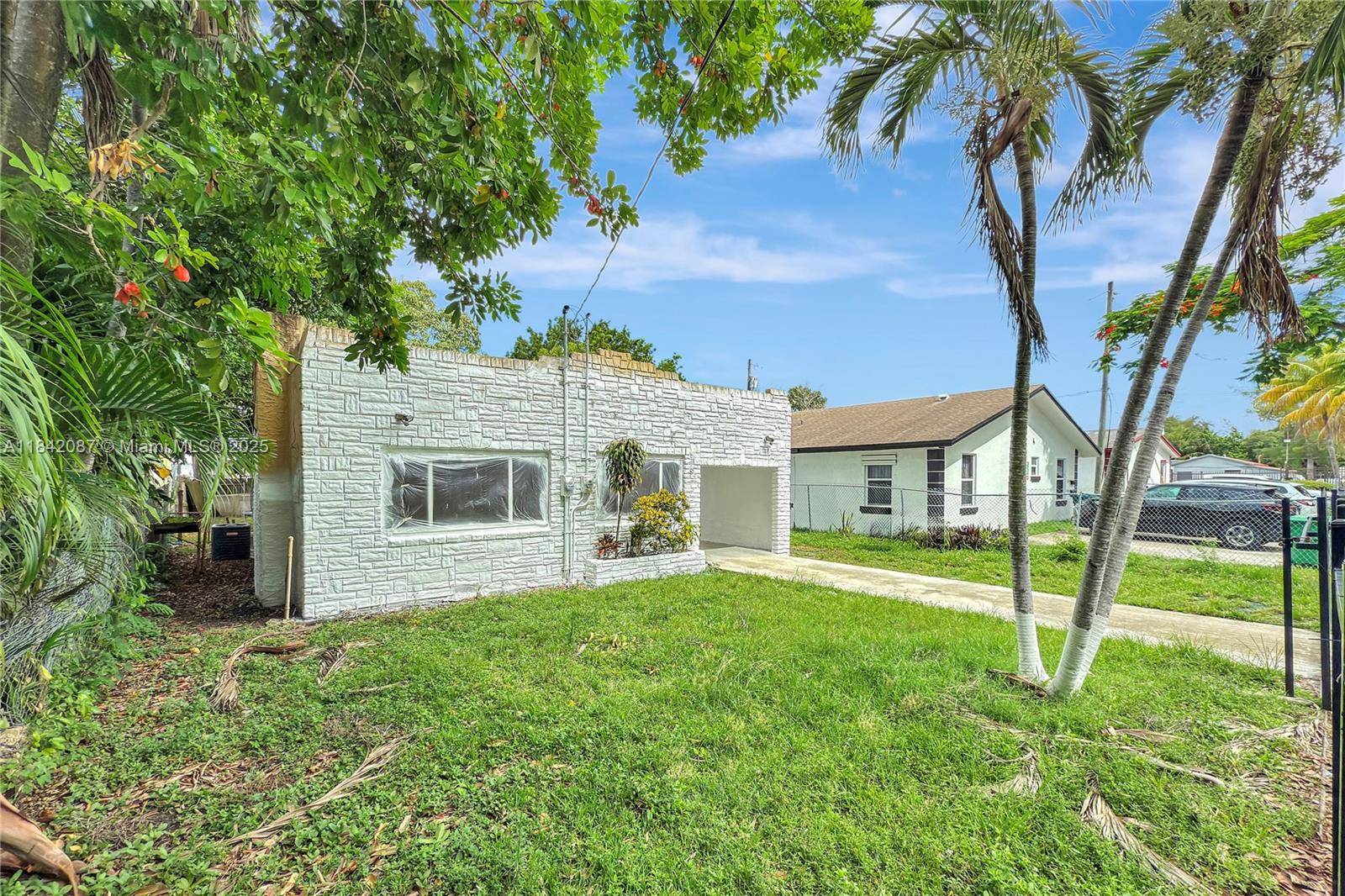 Miami Duplex for Sale ! This Value Add income producing property offers two units a spacious 3 bedroom, 1 bathroom front unit currently vacant and ready for immediate occupancy and ...