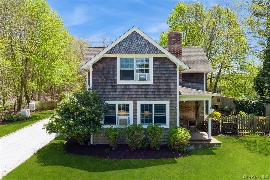 Discover this beautifully restored 4 bedroom, 2 bath farmhouse situated on highly desirable Oregon Road in the heart of North Fork wine country.