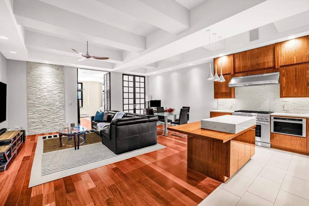 Spanning approximately 1, 100 square feet with soaring 12 foot ceilings, this oversized one bedroom at The Armory, combines dramatic loft proportions with modern upgrades and full service living.