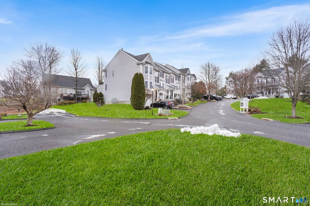 Welcome to 5003 Heartwood Ln in Danbury, where a serene, tree lined setting meets thoughtful modern updates.